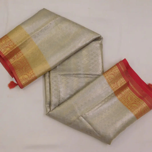 Pure Banarasi tissue Saree with contrast red boarder and tassles on pallu