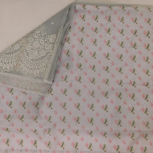 Pure Banarasi organza saree with white floral cut work and contrast blouse