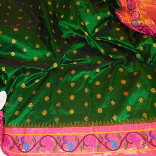 Pure silk gadhwal paithani with golden zari butti and peacock boarder