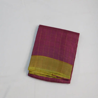 Pure Tussar silk saree with Checks all over  and golden zari boarder