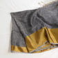 Pure linen saree with golden tall boarder and tassles on pallu