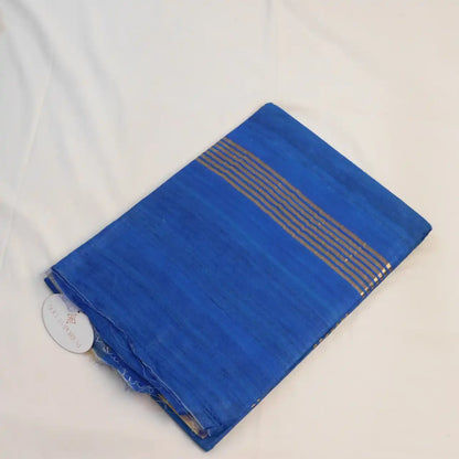 Plain Pure giccha tussar saree with contrast blue pallu